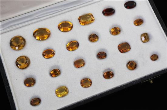 A case of twenty four unmounted citrines,